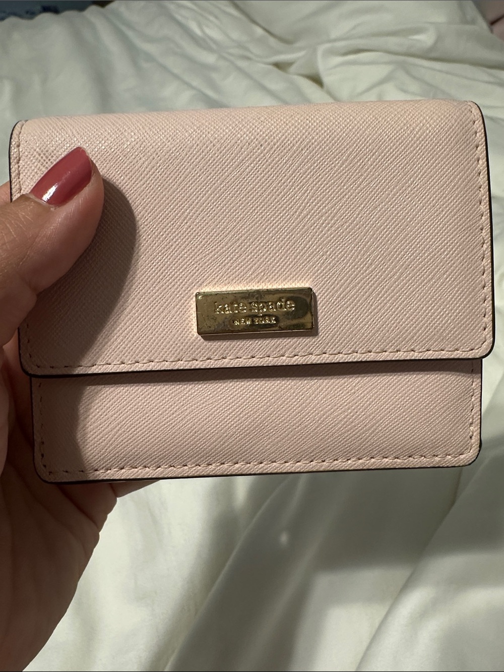 kate spade light blush pink Saffiano leather wallet with gold plaque